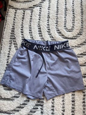 Purple Nike shorts